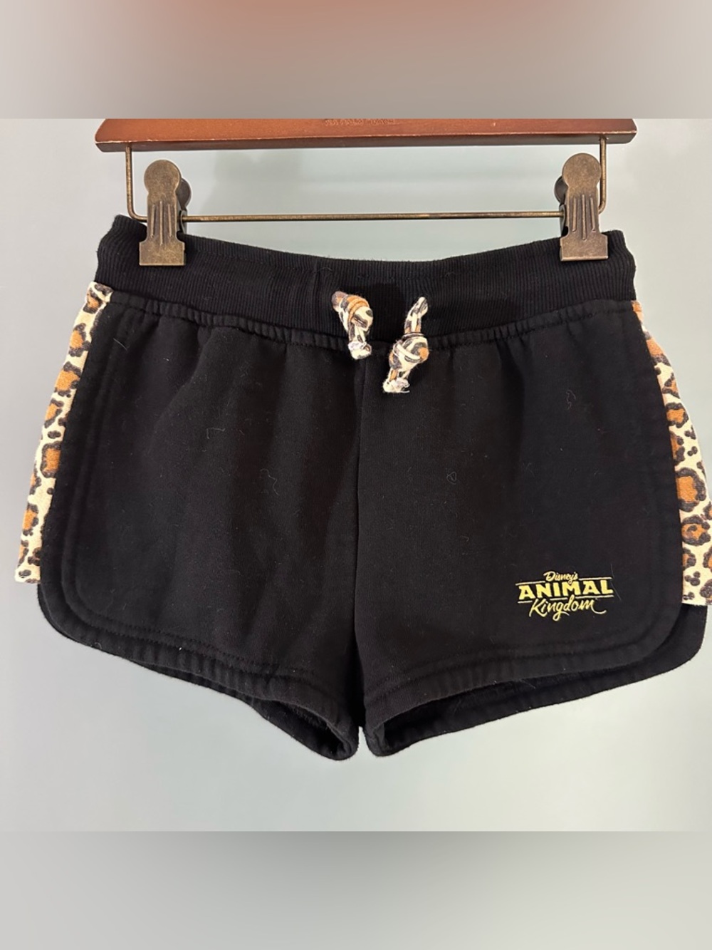Disney’s Animal Kingdom girls shirts w animal prints on sides